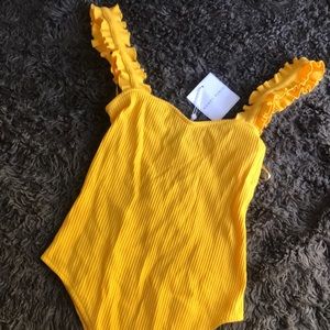 NEW yellow bodysuit